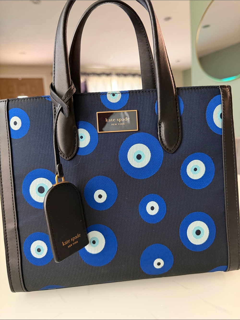 kate spade Navy Tote with Blue Evil Eye Motif and Black Trim